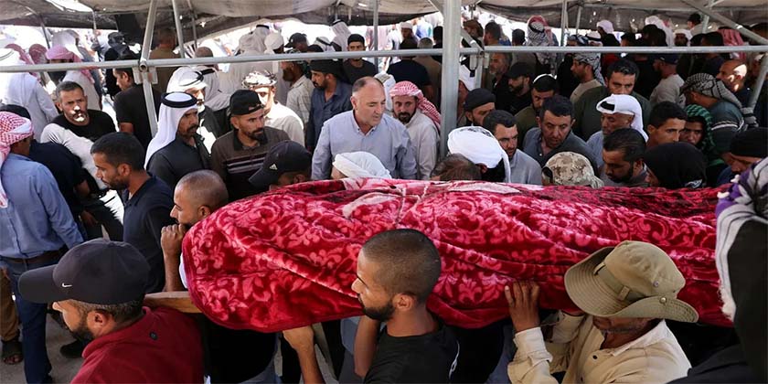 Десятки человек на похоронах палестинца, застреленного поселенцем